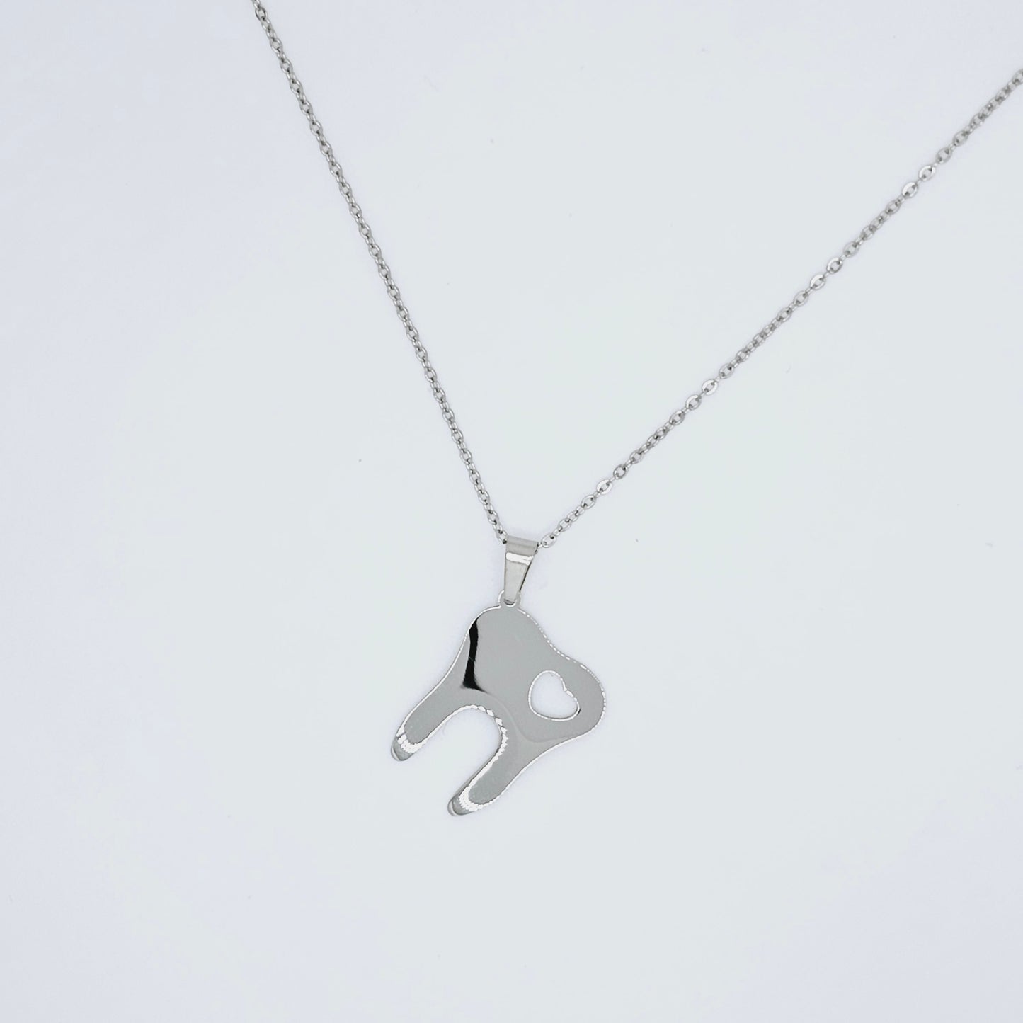 Love molar tooth stainless steel necklace